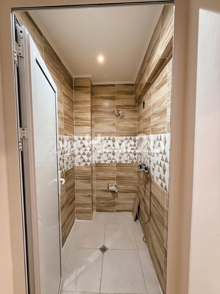 Продава МНОГОСТАЕН, гр. Шумен, Център, снимка 11 - Апартаменти - 53960095